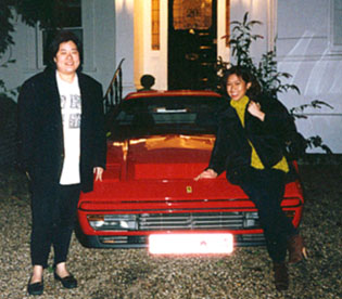 Posing with a Ferrari with Sharon